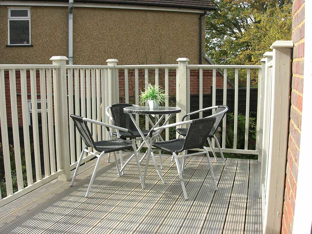 Seating area and decking project leading into garden